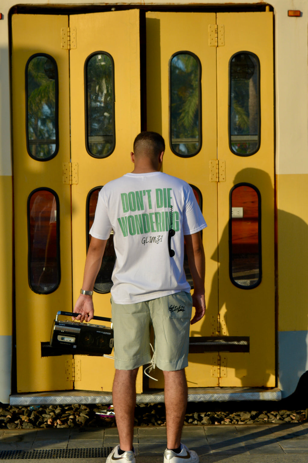 "DON'T DIE WONDERING" Unisex Graphic Tshirt.